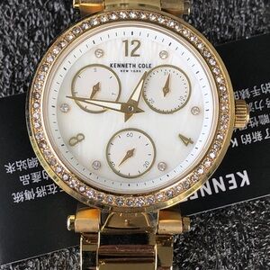 Kenneth Cole Gold-Tone Crystal Bezel Women’s Bracelet Watch with White Dial